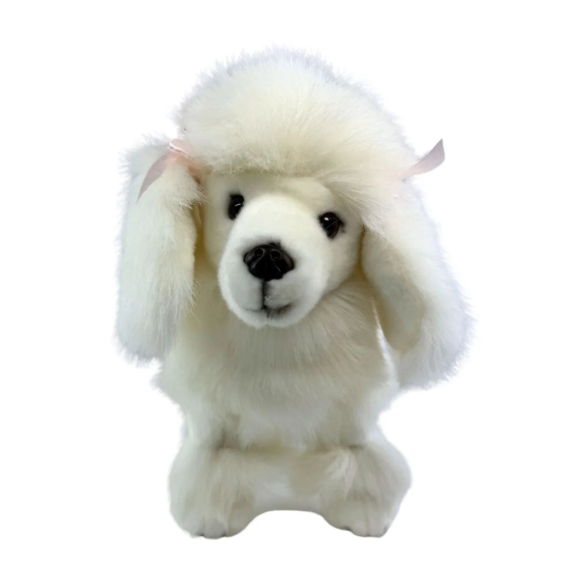 Barboncino bianco di peluche in piedi con pelo morbido e fiocchi