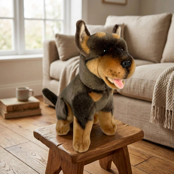 Peluche realistico di cane Kelpie seduto con soffice pelliccia marrone